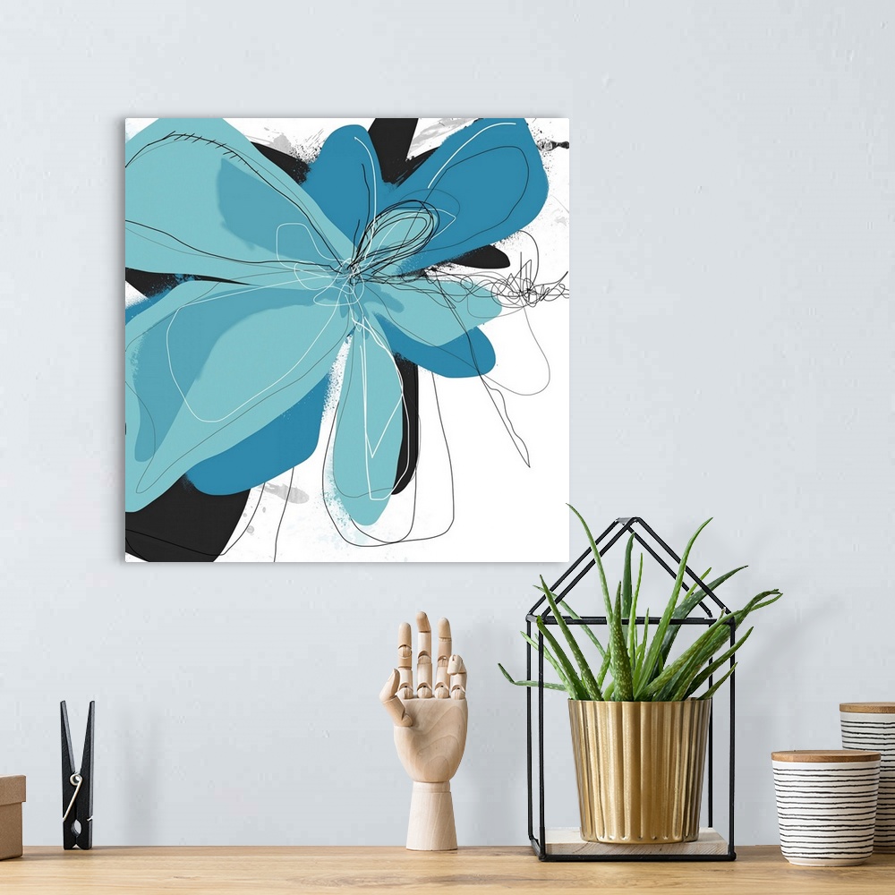 A bohemian room featuring This abstract piece of artwork is of a blue floral with light illustration that is used throughou...