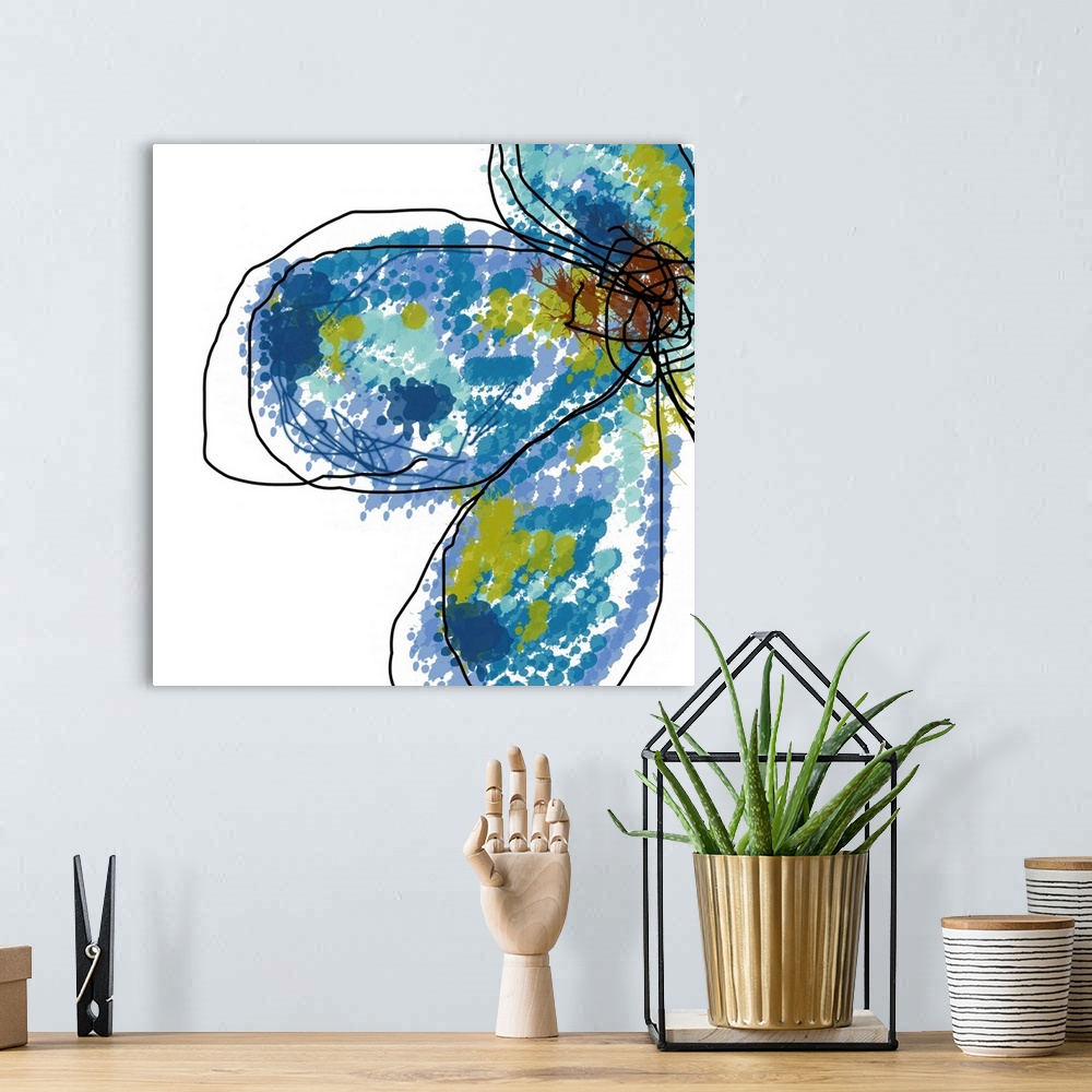 A bohemian room featuring This square wall art is an abstract digital drawing of a stylized flower.
