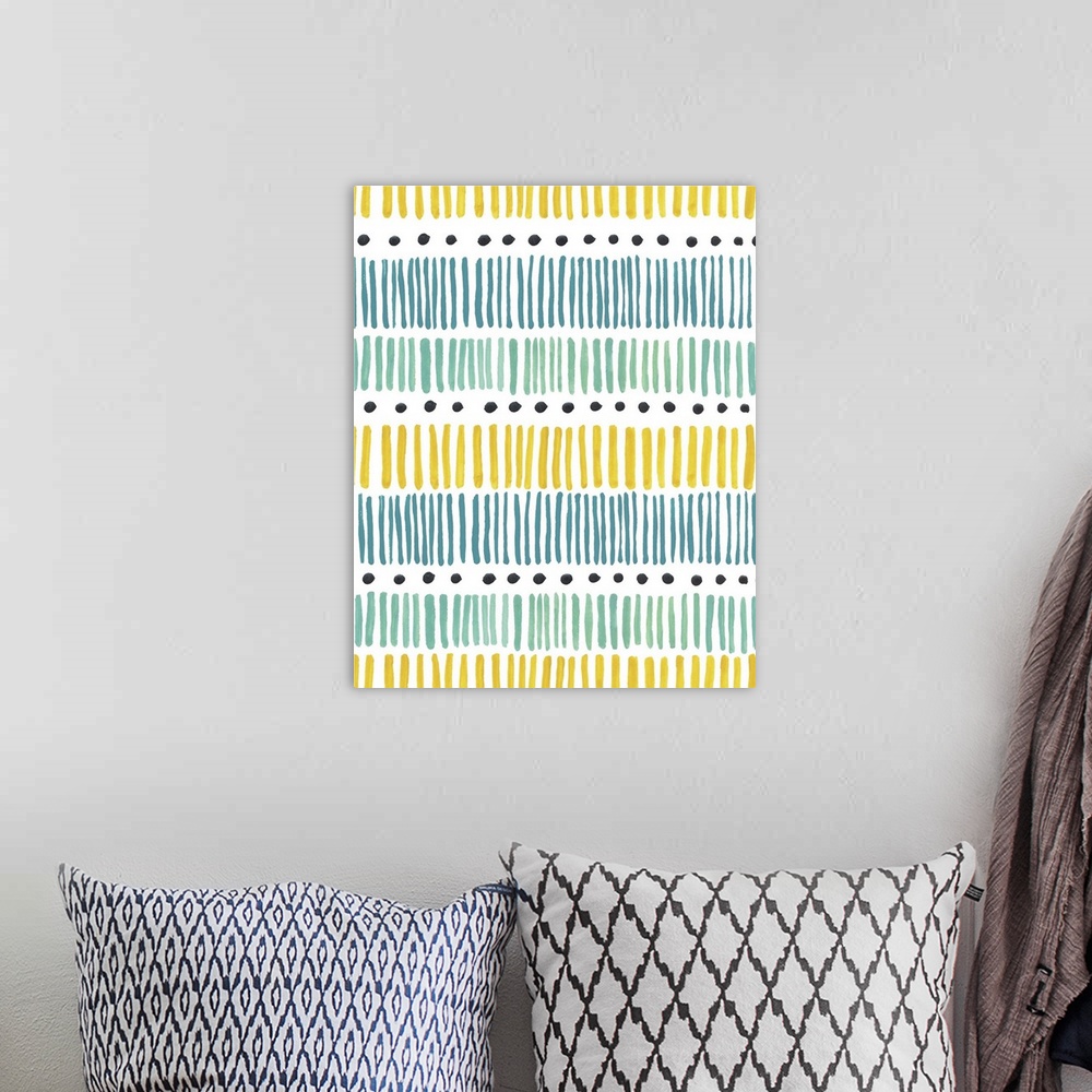 A bohemian room featuring Abstract artwork made of horizontal layers of stripes and dots in blues and yellows.