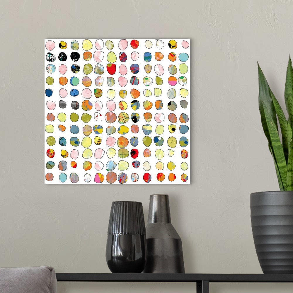 A modern room featuring This art print is a loose modern take on a classic design with a multitude of circular designs in...