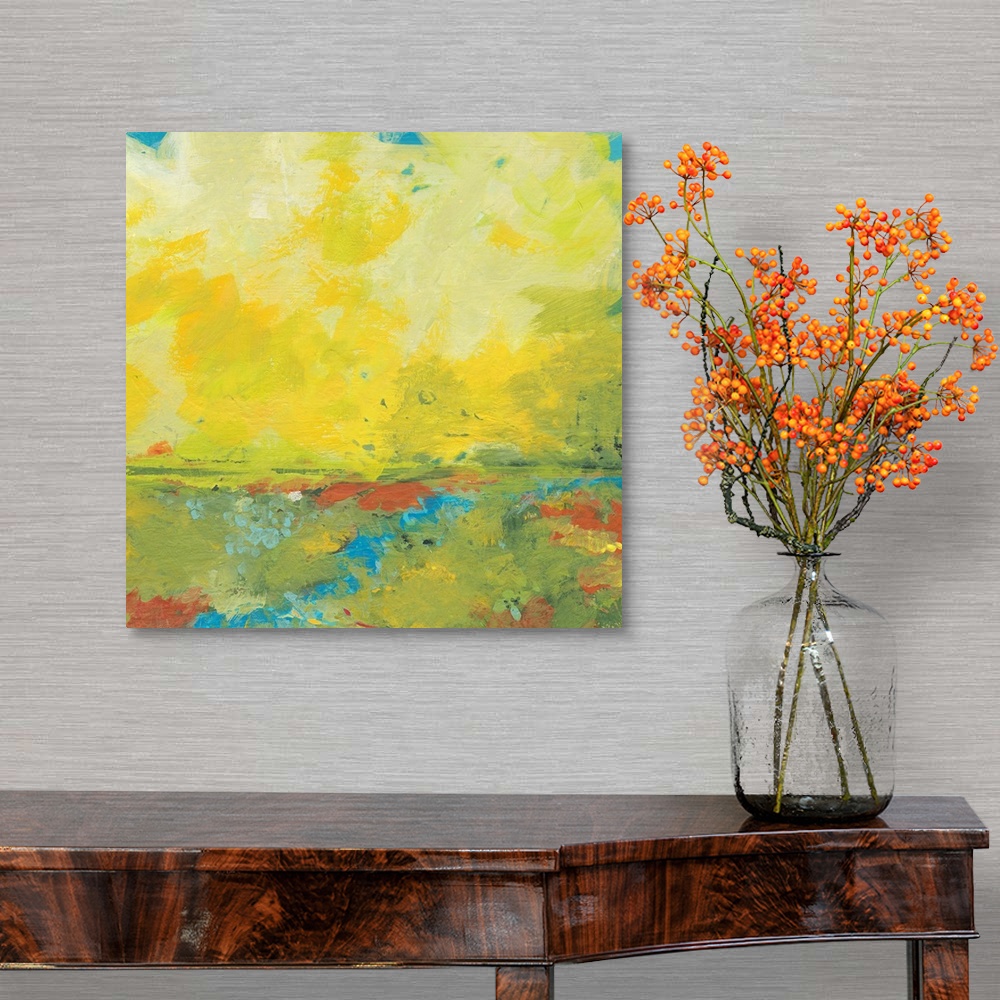 A traditional room featuring Giant, square abstract painting of earth and sky meeting.  Golden warm colors of the sky meet a h...