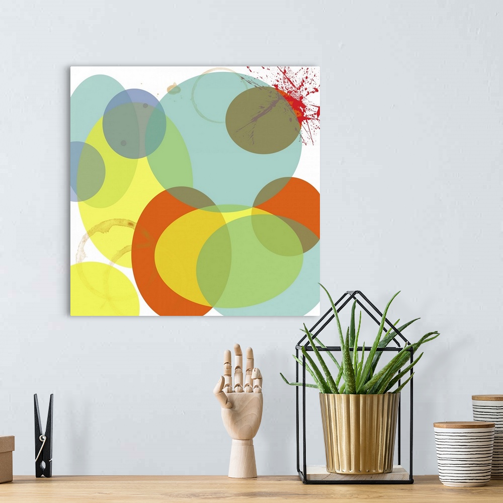 A bohemian room featuring this art print and print on demand canvas is an explosion of circles in soft tones and a paint sp...