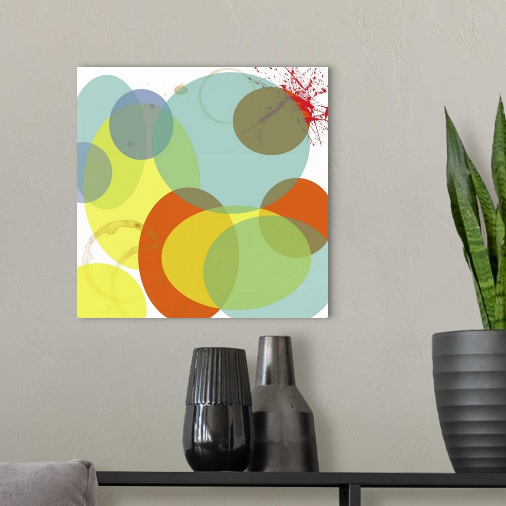 A modern room featuring this art print and print on demand canvas is an explosion of circles in soft tones and a paint sp...