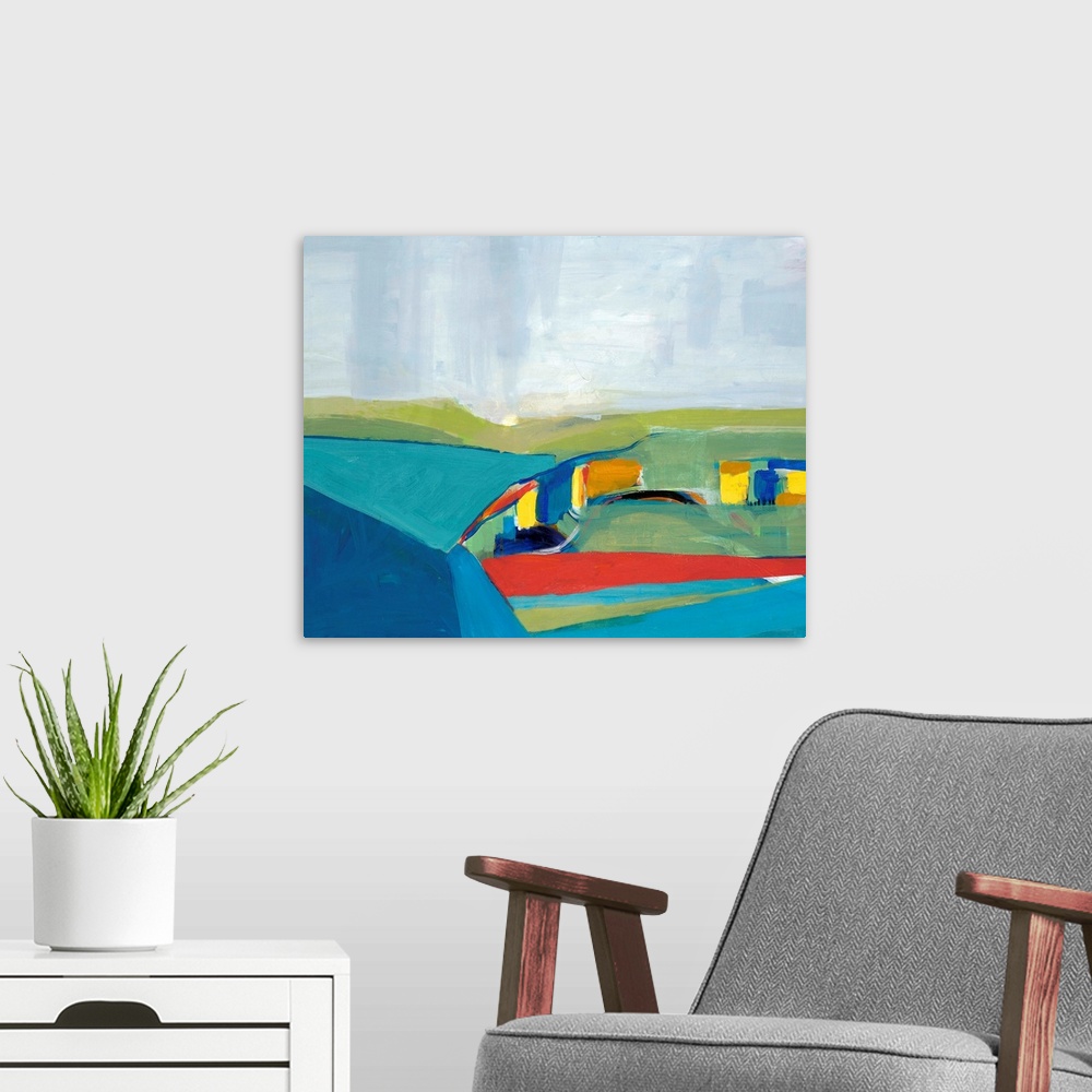 A modern room featuring Abstract landscape of rolling hills in multiple colors such as blue, green, red, and yellow.