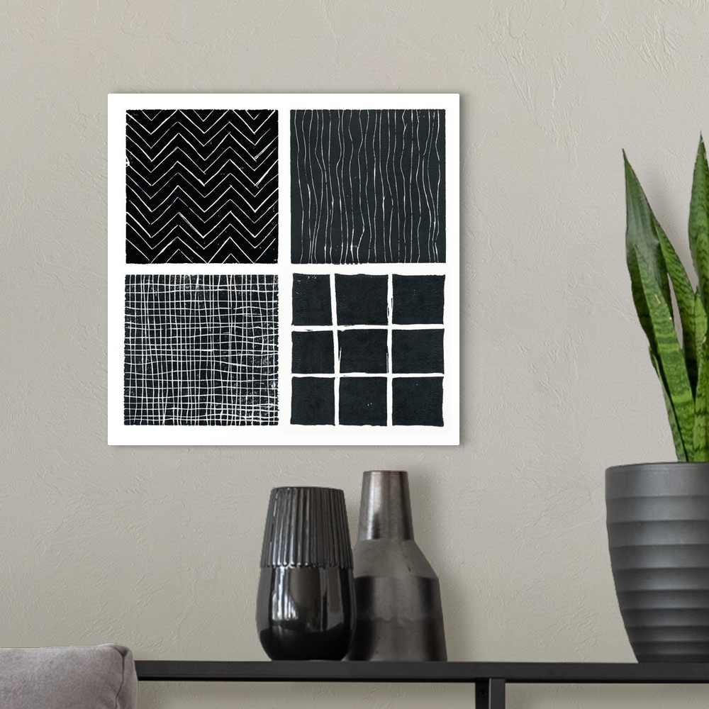 A modern room featuring Four b/w prints done with lino blocks and grouped as a single print.