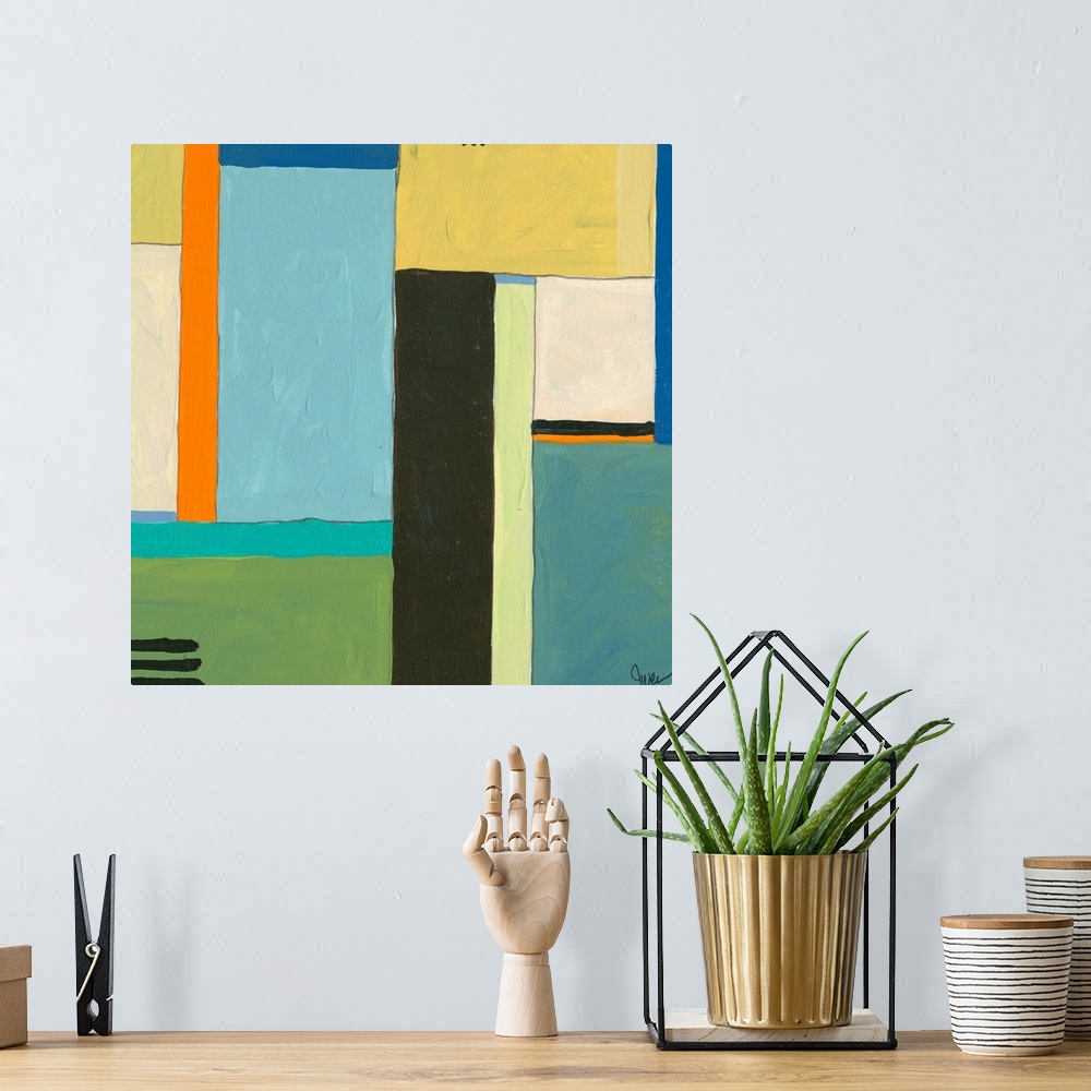 A bohemian room featuring An acrylic painting on archival matboard. Geometric shapes meeting together.