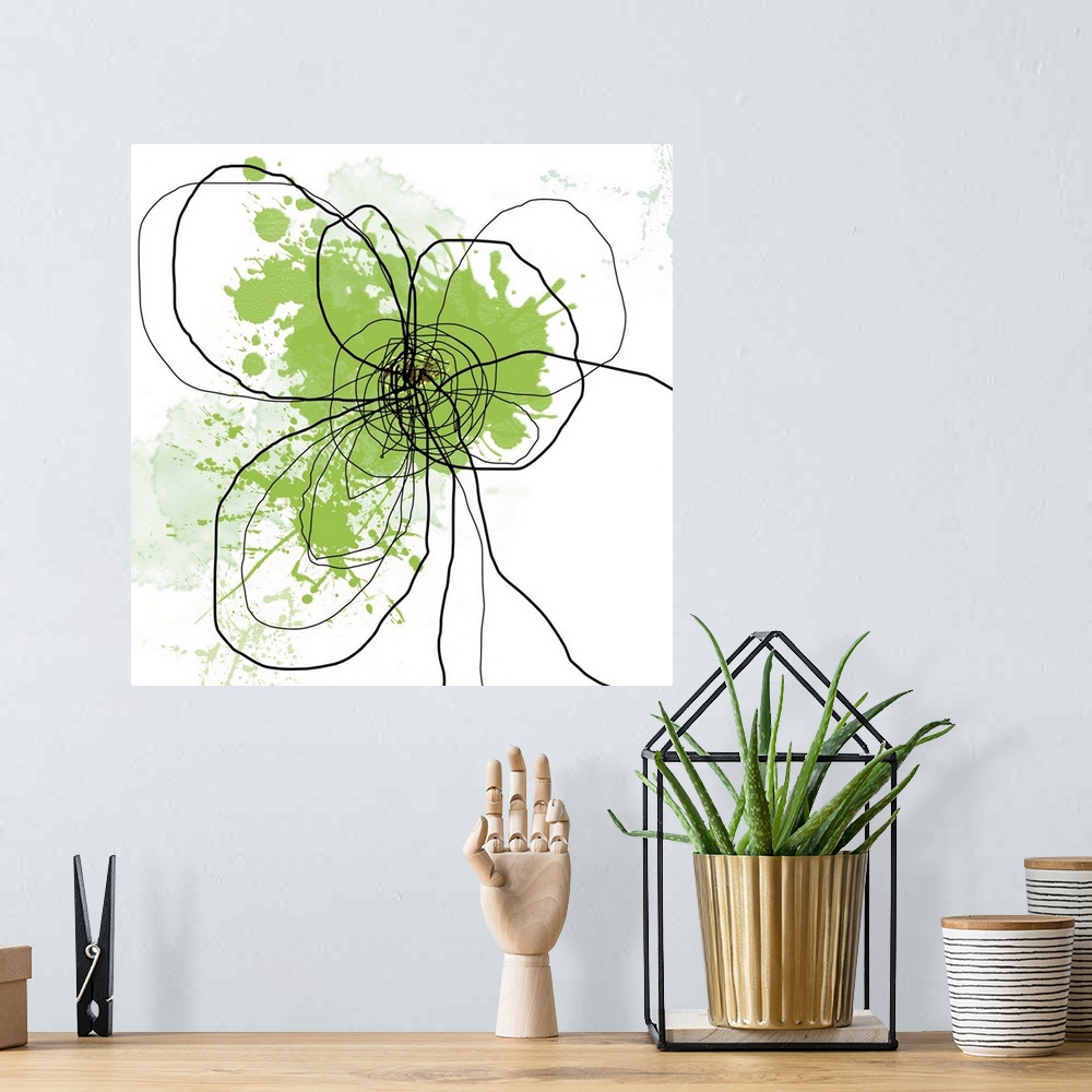 A bohemian room featuring Oversized, square, abstract art of the outline of a flower illustrated with squiggly black lines ...