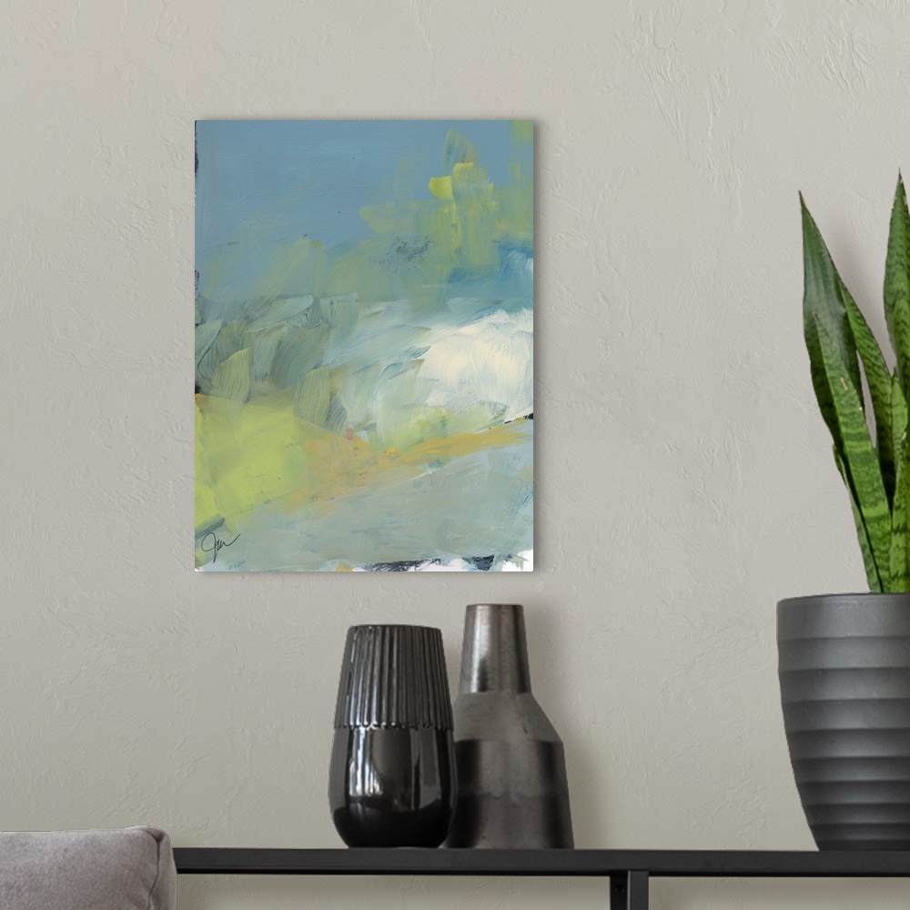 A modern room featuring Contemporary artwork featuring an abstract landscape of subdued colors in striated brush strokes.