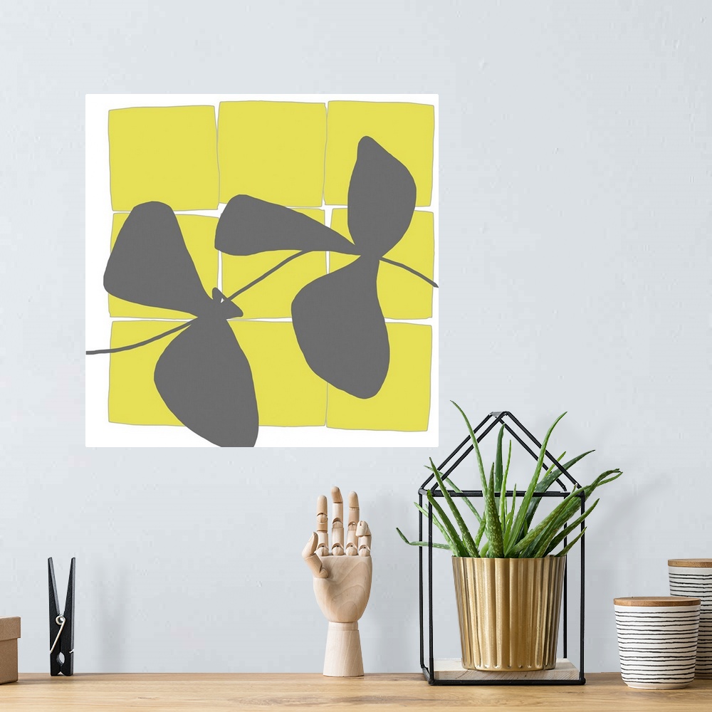 A bohemian room featuring Modern art vector display of bright yellow squares and a grey silhouettes of leaves running throu...