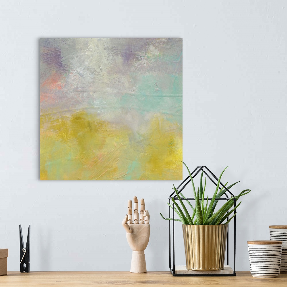 A bohemian room featuring A soft contemporary abstract painting with gray, yellow, teal, and purple hues with a hint of pink.