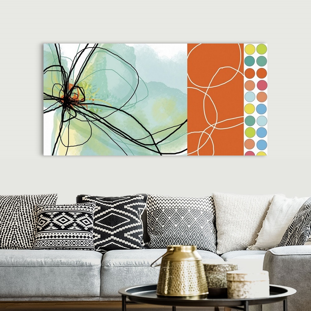 A bohemian room featuring Abstract canvas print of the outline of a flower on the left and multicolored polka dots on the r...