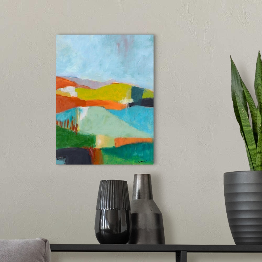A modern room featuring Contemporary painting of a colorful, abstract landscape with rolling hills.