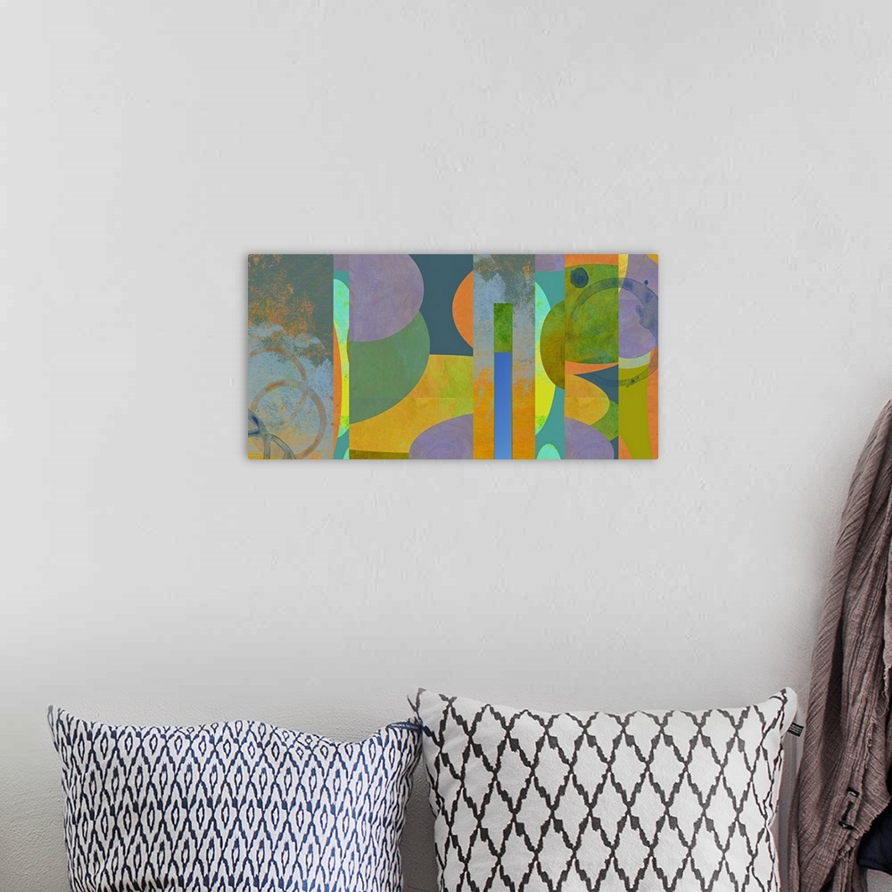 A bohemian room featuring A collage of original acrylic paintings all woven together to create a colorful image.