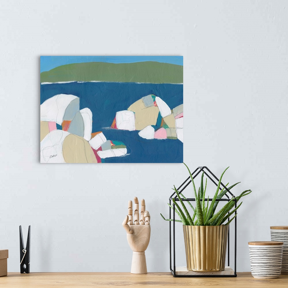 A bohemian room featuring An abstract contemporaray painting of organic round shapes resembling rocks in a harbor