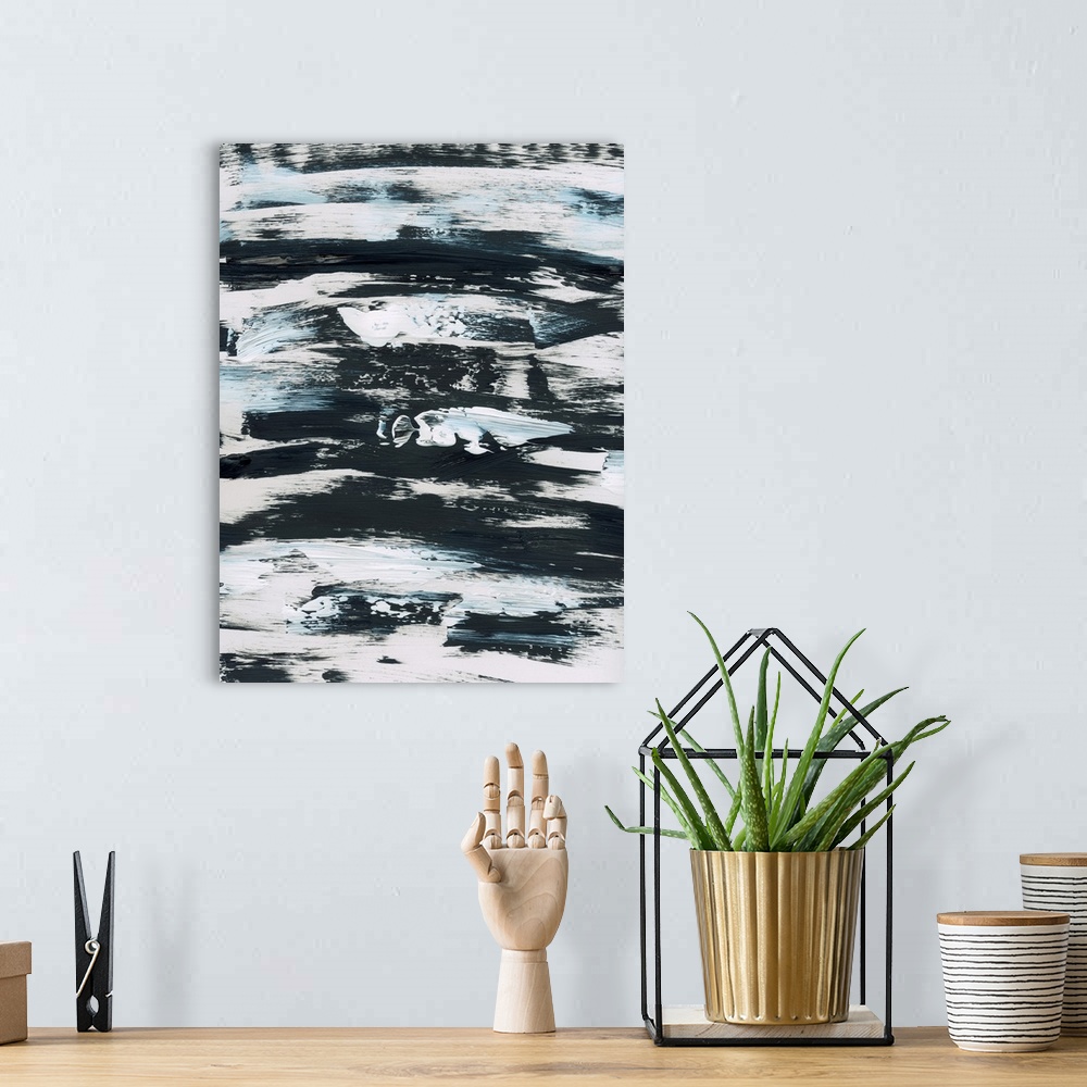A bohemian room featuring Vertical abstract painting of textured horizontal brush strokes in black and white with hints of ...