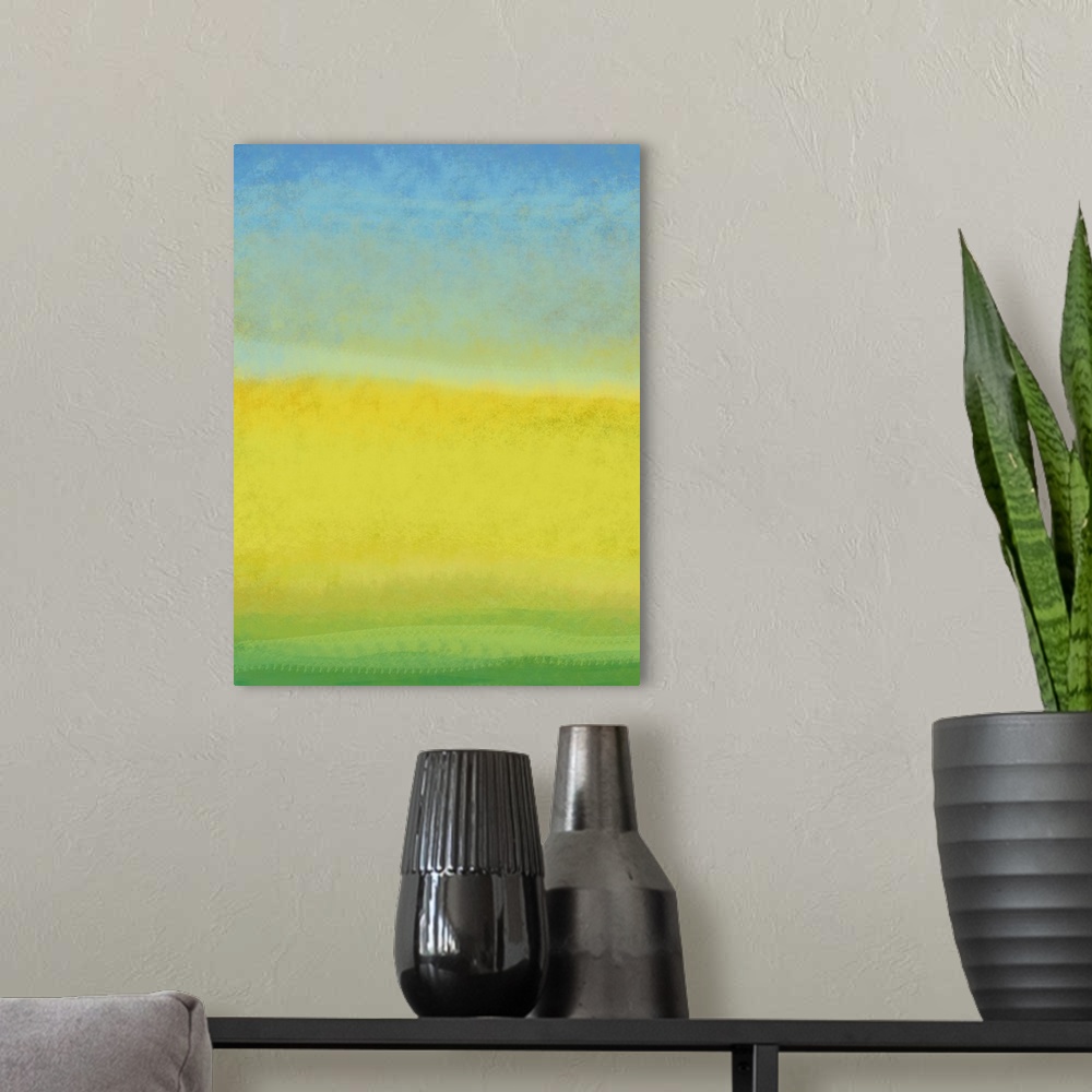 A modern room featuring Contemporary abstract art using vibrant tones of green, yellow and blue.