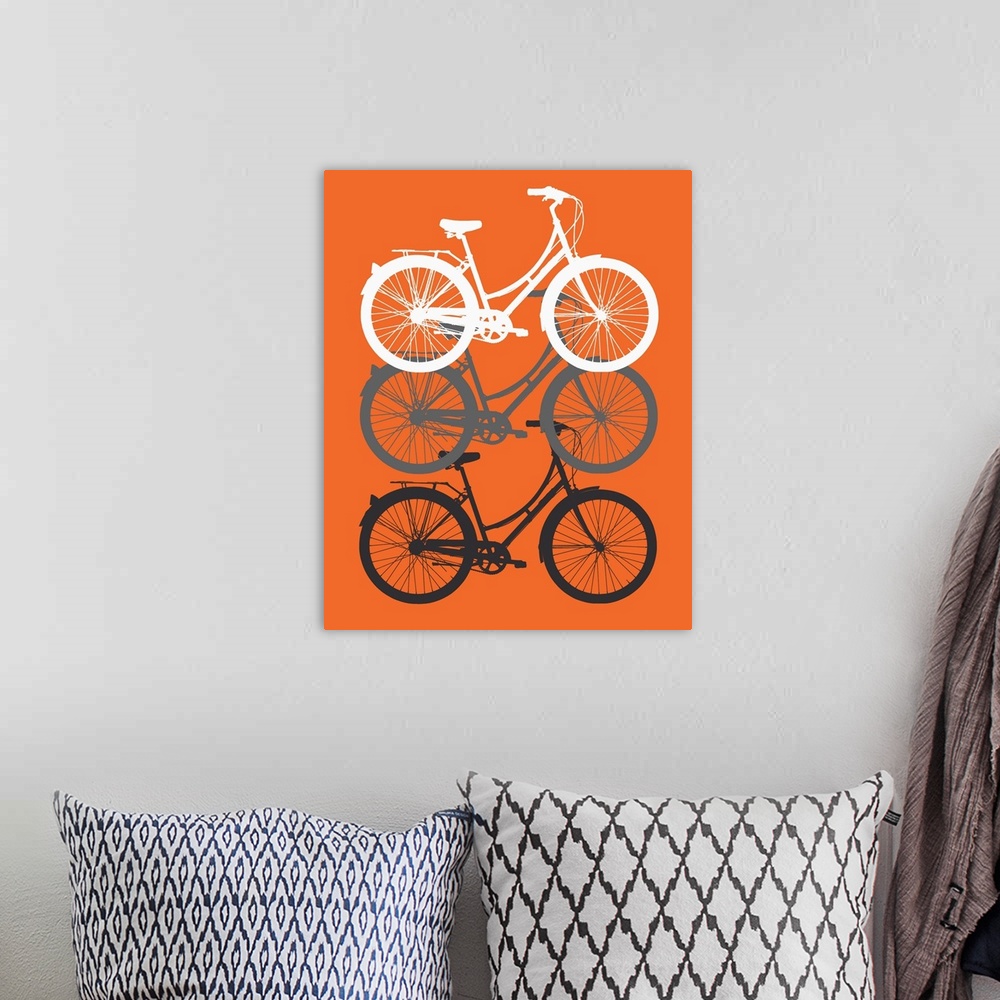 A bohemian room featuring Three Bikes on Orange