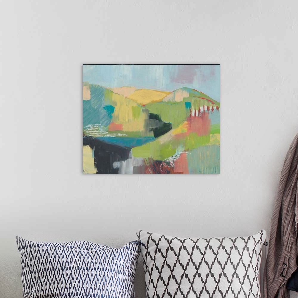 A bohemian room featuring Contemporary painting of a hilly pastel landscape made with patchwork-like brushstrokes.