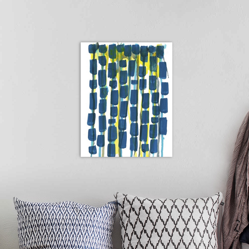 A bohemian room featuring Contemporary artwork featuring a chain of navy blue shapes with yellow areas.