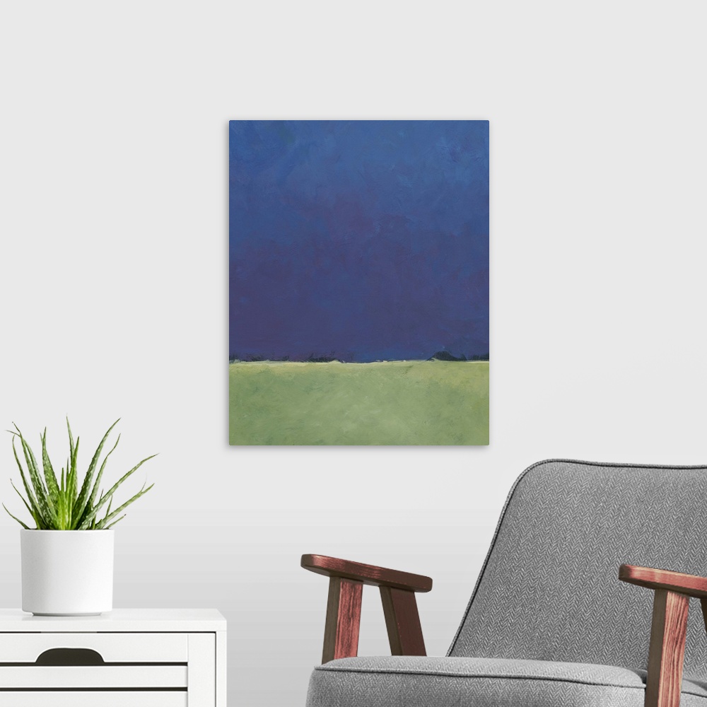 A modern room featuring A deep purple and blue horizon gives way to a soft green foreground in this minimalist landscape....