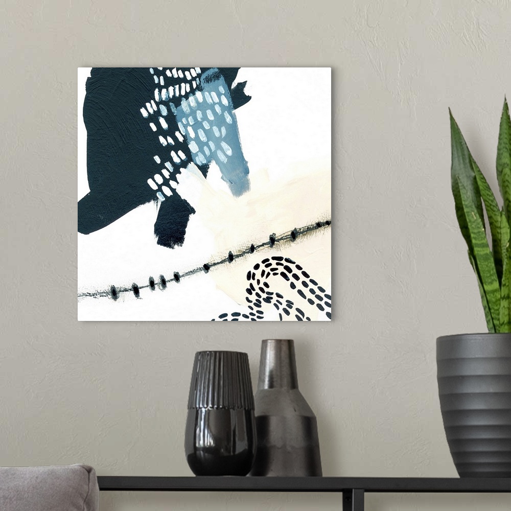 A modern room featuring Contemporary abstract art using neutral colors, and patterns.