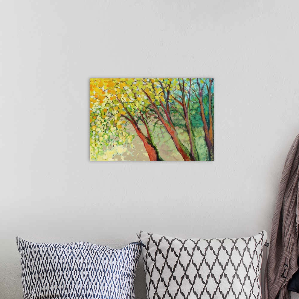 A bohemian room featuring A contemporary impressionistic landscape of three painterly trees and abstract leaves made large ...