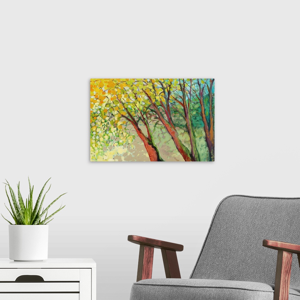 A modern room featuring A contemporary impressionistic landscape of three painterly trees and abstract leaves made large ...
