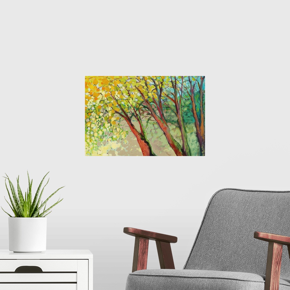 A modern room featuring A contemporary impressionistic landscape of three painterly trees and abstract leaves made large ...