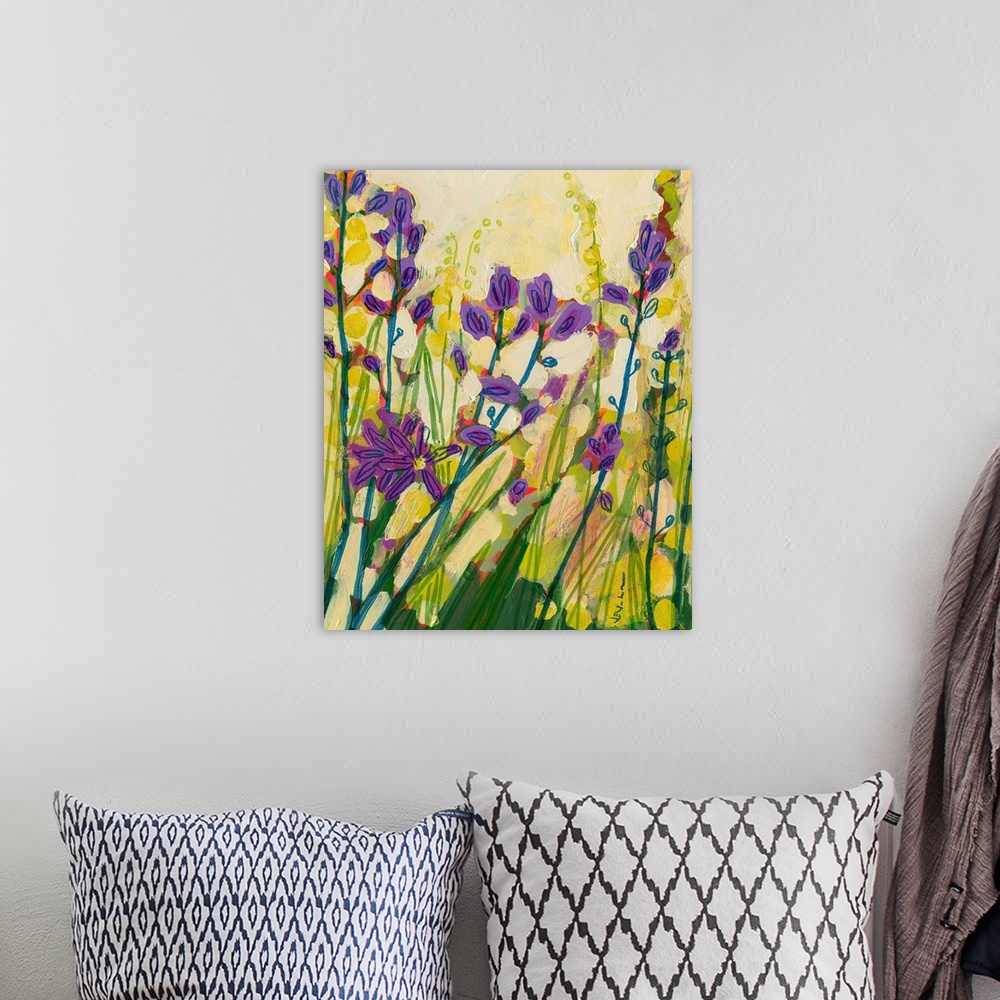 A bohemian room featuring Large painting of blooming camas flowers growing tall with bright sunshine. Dominated by warm, vi...
