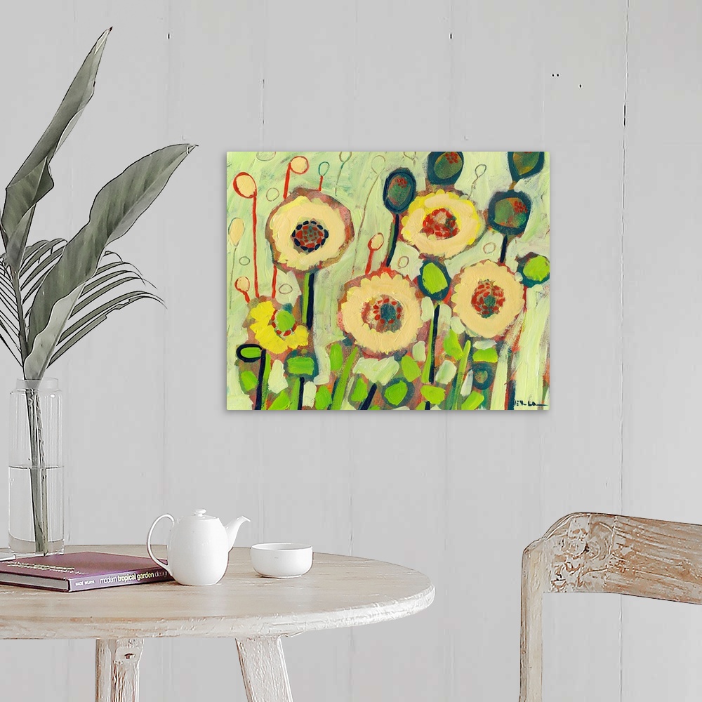 A farmhouse room featuring Colorful wall art painting of blooming flowers in a garden.