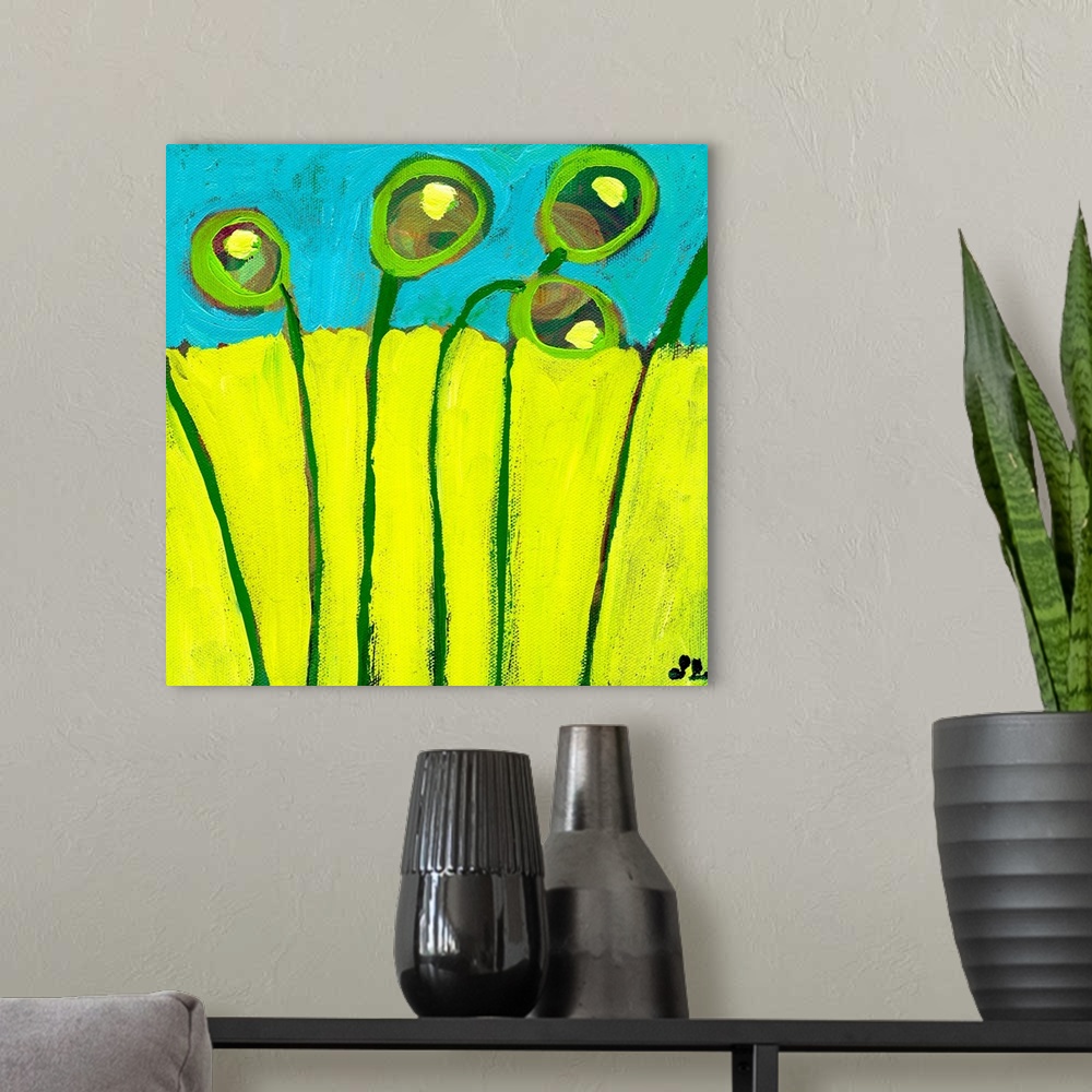 A modern room featuring Contemporary painting of circular flowers coming up through the earth and growing towards the sky.
