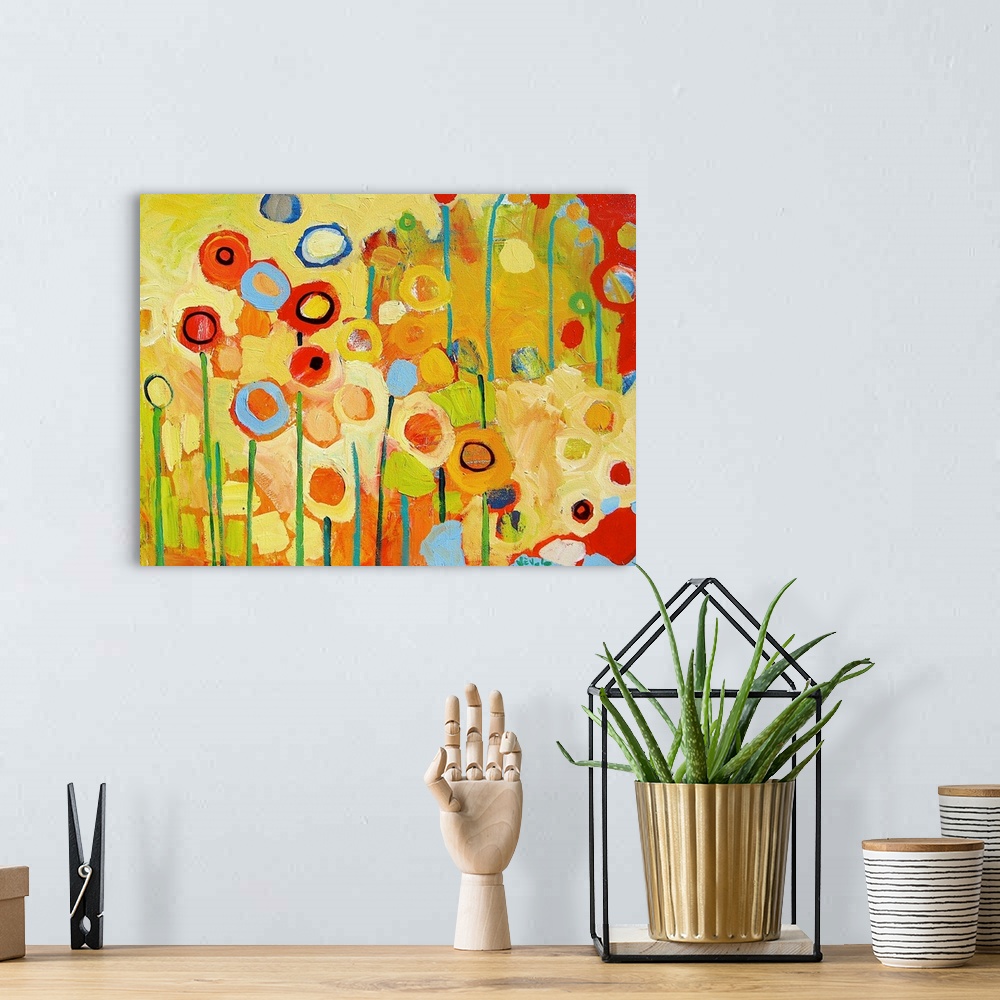A bohemian room featuring An abstract still life of colorful circles and lines representing flowers and stems.