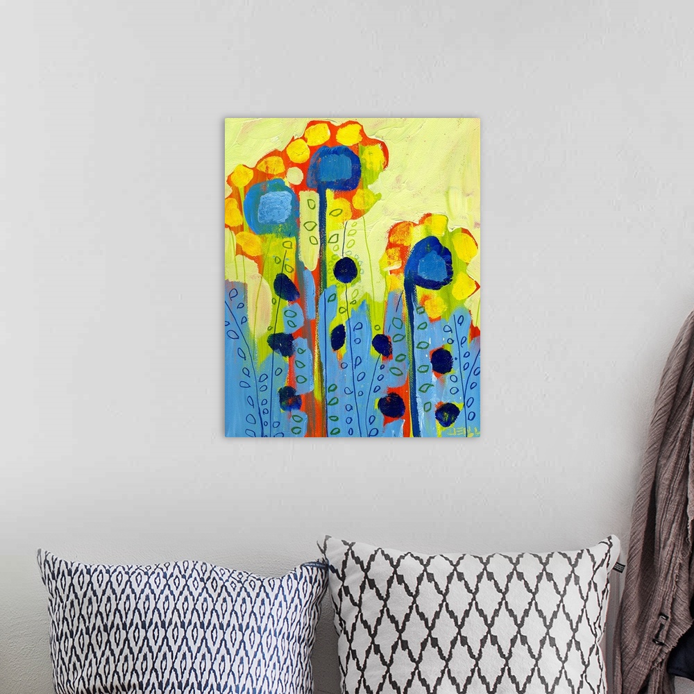 A bohemian room featuring Portrait, abstract painting of several tall flowers with circular shapes used for petals and leav...