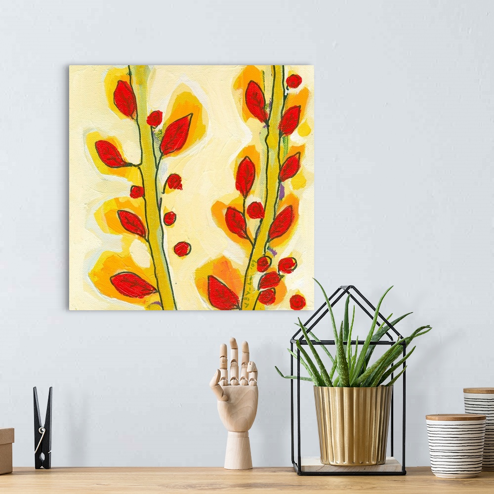 A bohemian room featuring Contemporary art piece of two plant stalks with small leaves sticking out of the sides.