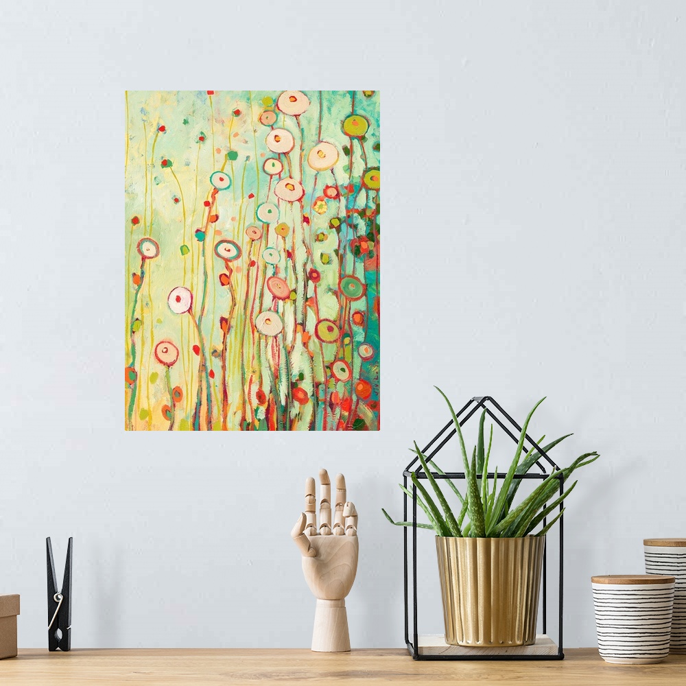A bohemian room featuring Bright contemporary painting of tall flowers made from circles.