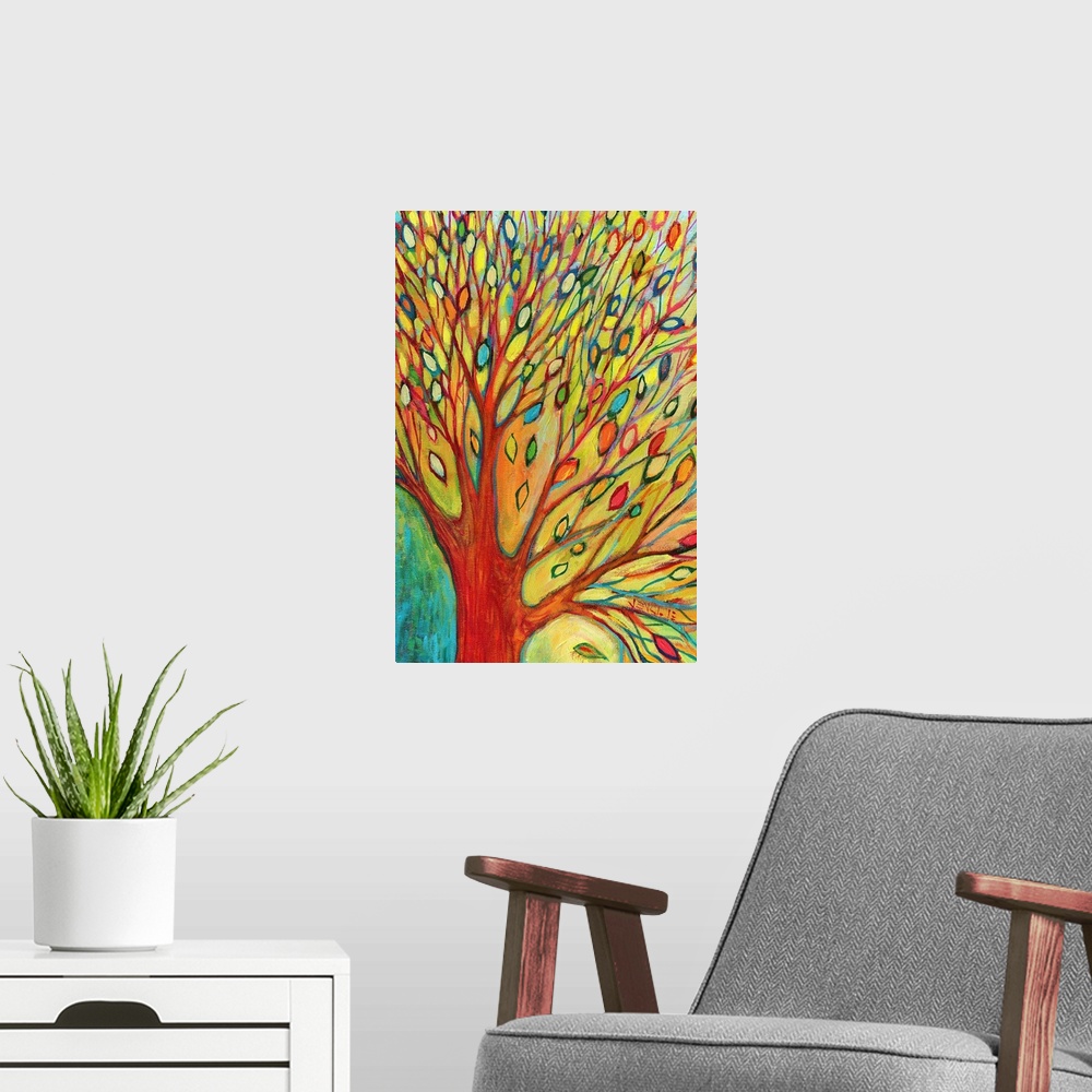 A modern room featuring A bright mixture of colors is used to paint tiny leaves on a massive tree that is half shown.