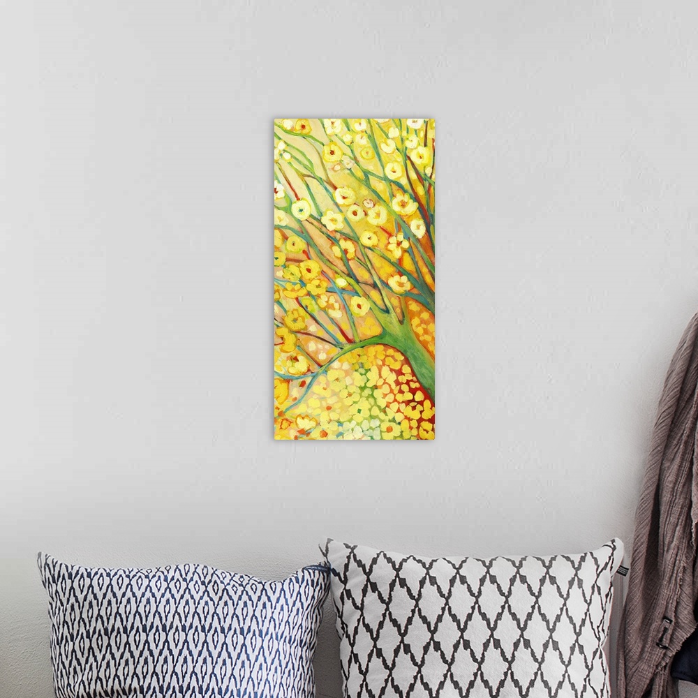 A bohemian room featuring Budding yellow flowers sprout from tree branches and fall below on this vertical print.