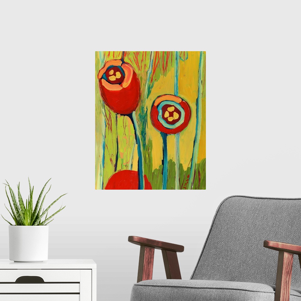 A modern room featuring Big contemporary art focuses on a few brightly colored flowers sitting against a background of al...