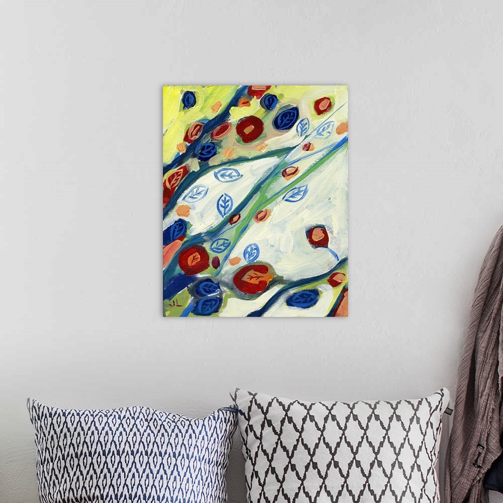A bohemian room featuring A piece of contemporary artwork that uses mostly primary colors to paint leaves growing off branc...