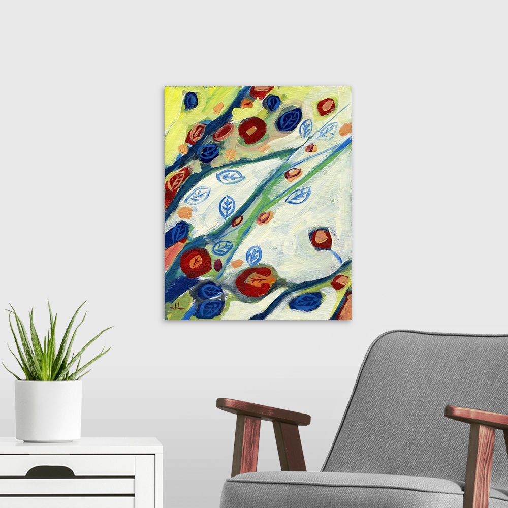 A modern room featuring A piece of contemporary artwork that uses mostly primary colors to paint leaves growing off branc...