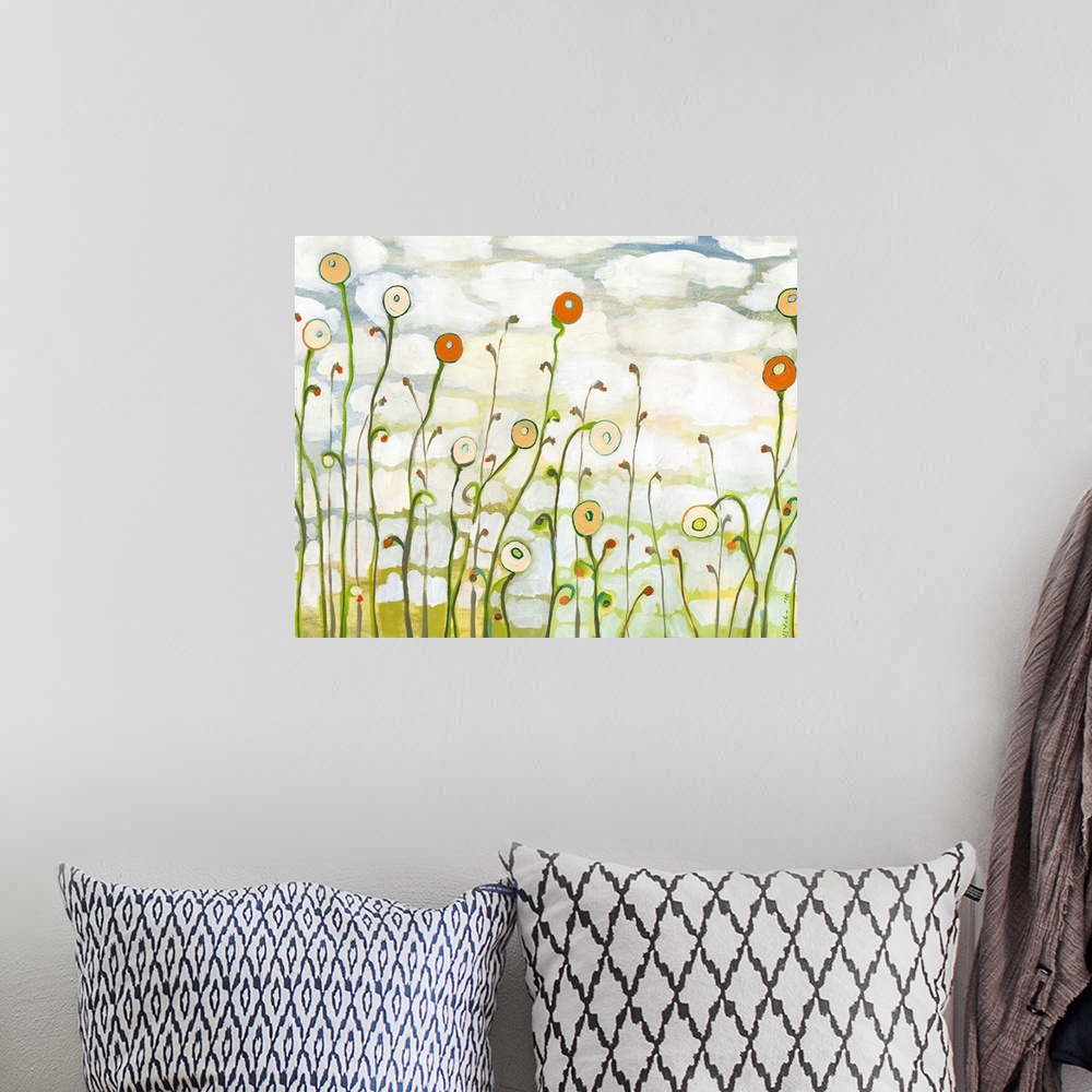 A bohemian room featuring A contemporary abstract landscape painting of poppy flowers and a cloudy sky in the background.