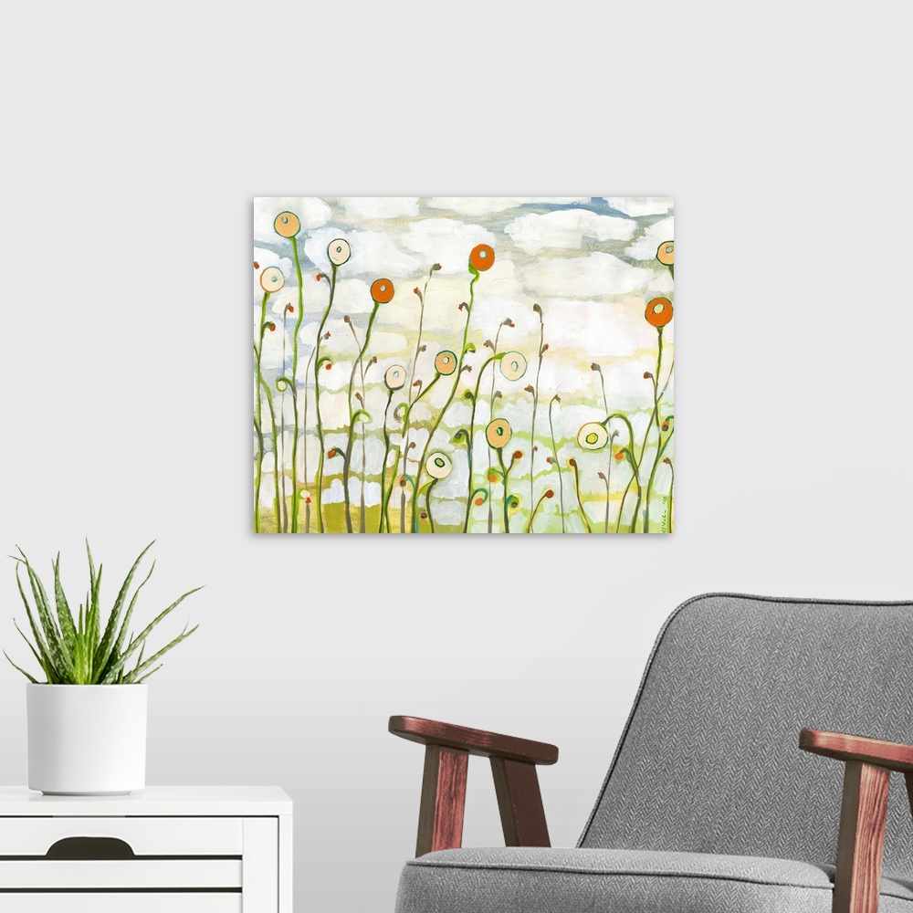 A modern room featuring A contemporary abstract landscape painting of poppy flowers and a cloudy sky in the background.