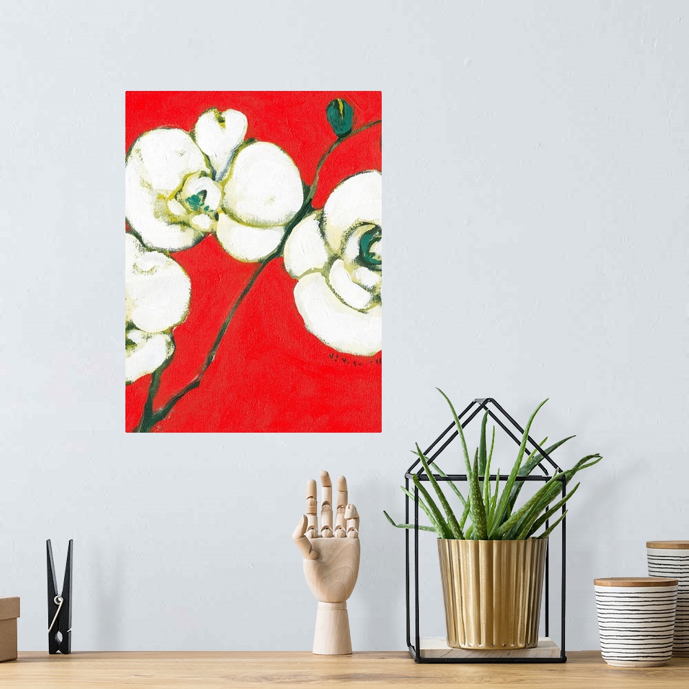 A bohemian room featuring Abstract painting of three flowers on stems against a warm and bright background.