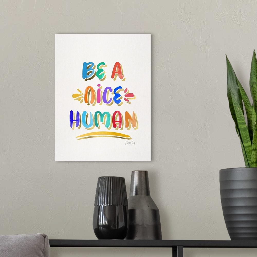 A modern room featuring Be A Nice Human