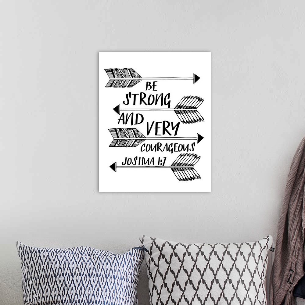 A bohemian room featuring Bible passage that reads "Be strong and very courageous," Joshua 1:7.