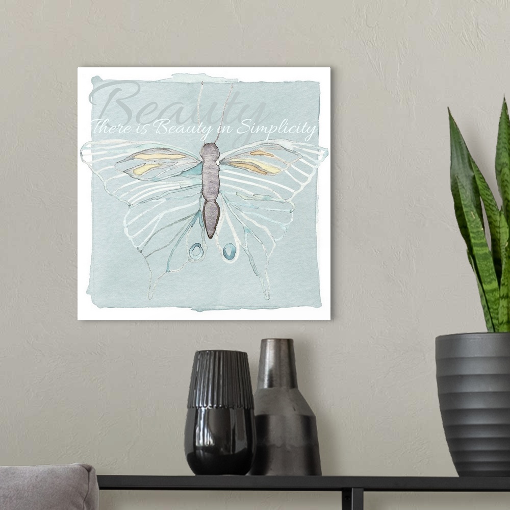 A modern room featuring Decorative watercolor painting of a butterfly with white outlined wings, and the phrase "There is...
