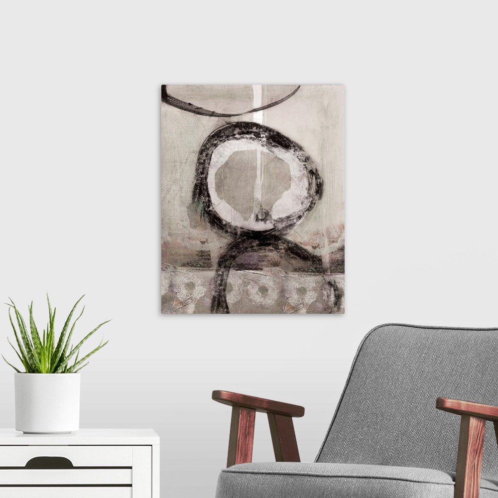 A modern room featuring A neutral, contemporary painting in earthy tones and organic, circular shapes