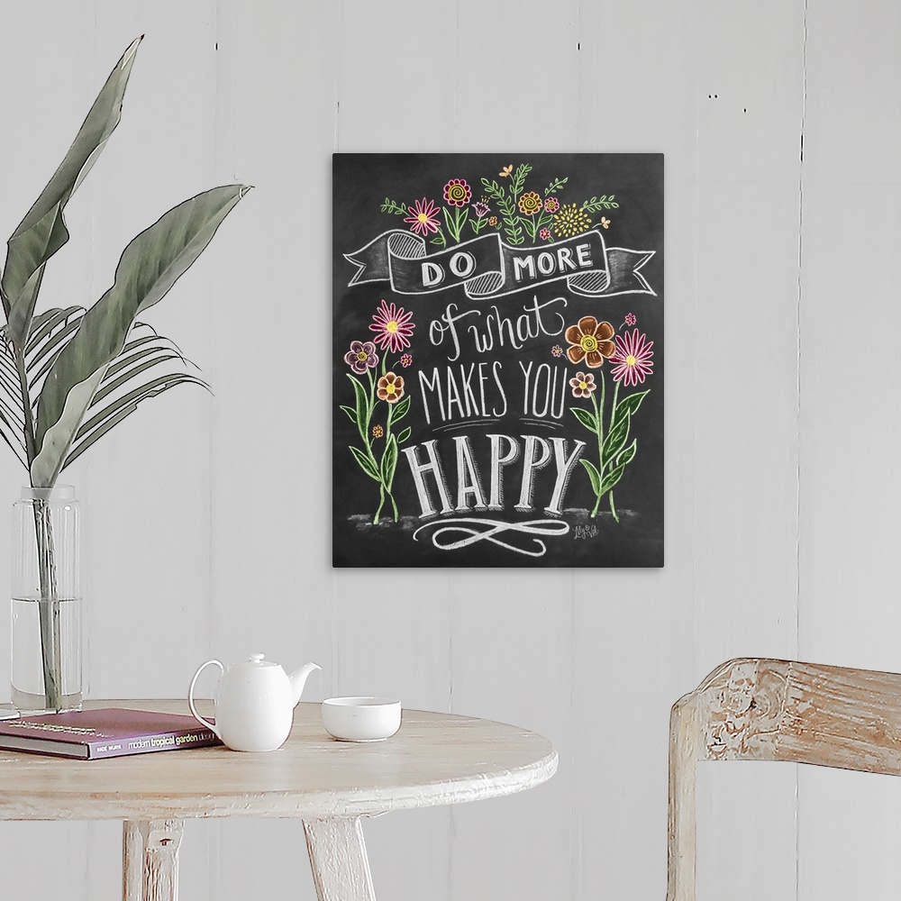 A farmhouse room featuring "Do more of what makes you happy" handwritten and illustrated with flowers.