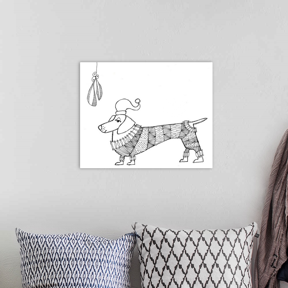 A bohemian room featuring Black and white line art of a dachshund in a patterned sweater under the mistletoe.