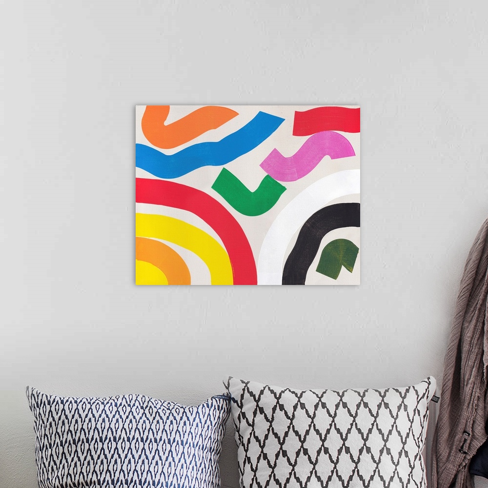 A bohemian room featuring A bright modern abstract painting featuring squiggly lines in primary colors